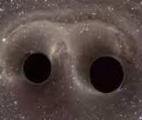 La vitesse d'un trou noir révélée grâce aux ondulations de l'espace-temps